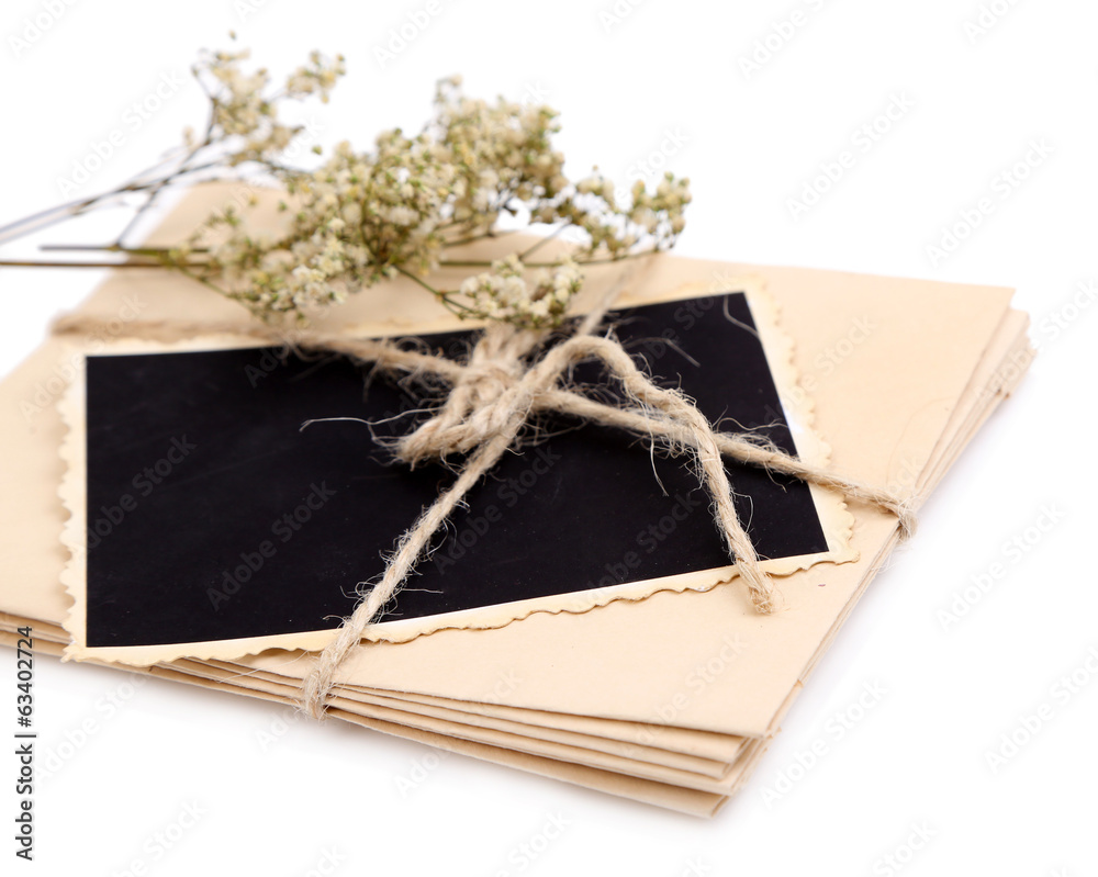Blank old photo, letters and dried flower, isolated on white