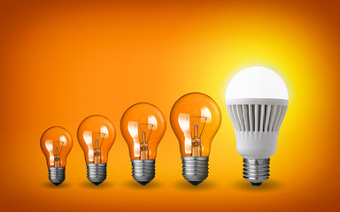 Row of light bulbs.Idea concept on orange background.