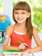 © Serhiy Kobyakov - Little girl is drawing using pencils