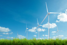 Wind Turbine With Grass And Blue Sky