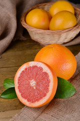 Wall Mural - Ripe grapefruit on table close-up