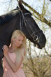 horse and blonde woman
