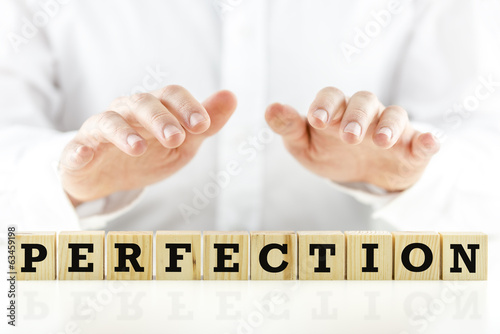 Fotografía Imagen conceptual con la palabra perfección