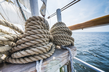 wooden pulley and ropes on old yacht.