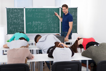 Teacher Teaching Mathematics To Bored Students