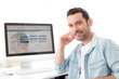 © Production Perig - Portrait of a young relaxed man using computer
