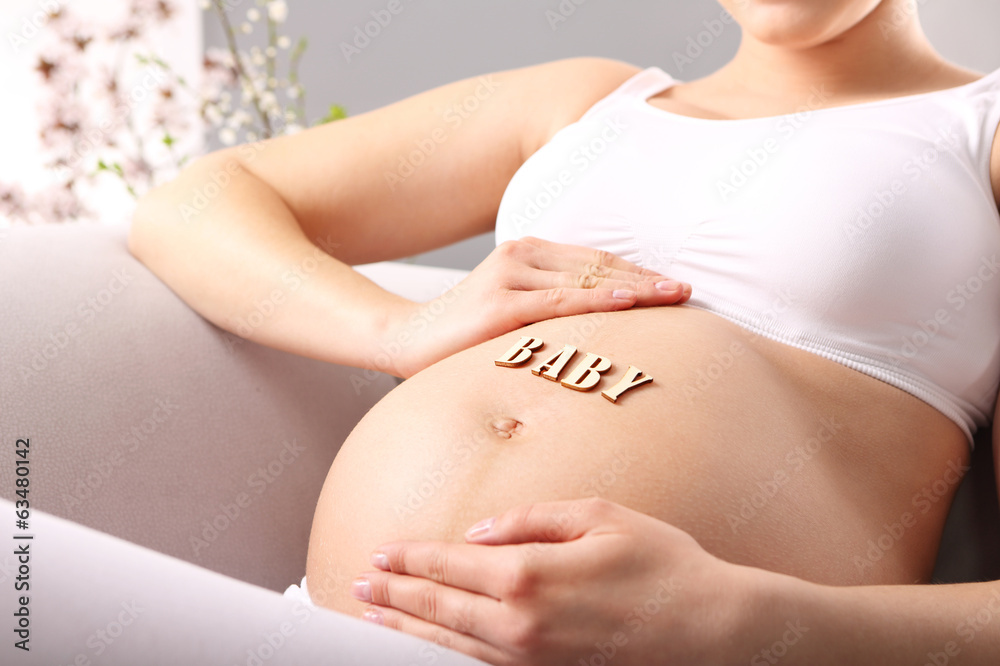 Ciążowy brzuszek - obrazy, fototapety, plakaty 