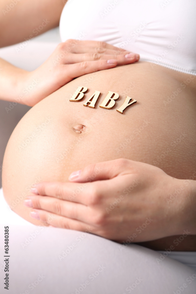 Brzuch kobiety w ciąży - obrazy, fototapety, plakaty 