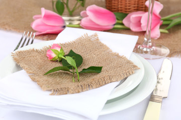 Table setting with spring flowers close up