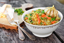 Asian Vegetarian Bulgur Pilaf With Chickpeas, Carrots And Garlic