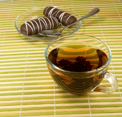 Wall Mural - image of a cup of tea and sweets