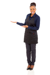 Poster - african waitress welcomes customers