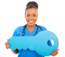 Poster - african medical doctor with key symbol