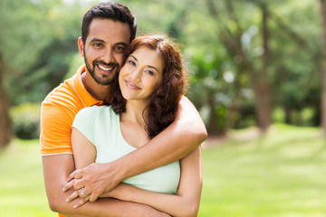 lovely young indian couple outdoors