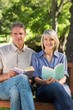 © WavebreakMediaMicro - Couple holding books in park