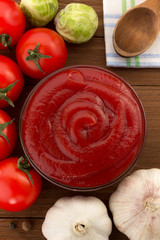 Sticker - tomato sauce in bowl on wood