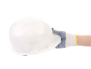 Hand holding white hard hat.