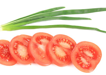 Canvas Print - Spring onions and sliced tomatoes.