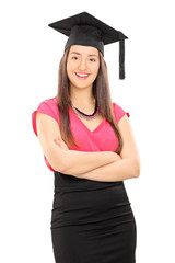 Wall Mural - Girl with graduation hat posing