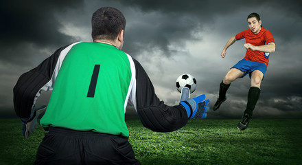 Two Football players in action outdoors