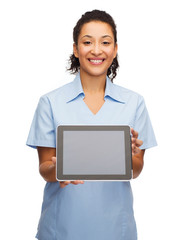 Sticker - smiling female doctor or nurse with tablet pc