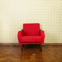 Wall Mural - Vintage room with old fashioned red armchair, wallpaper and weat