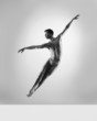 © Acronym - Sporty and athletic ballet dancer. Black and white image.