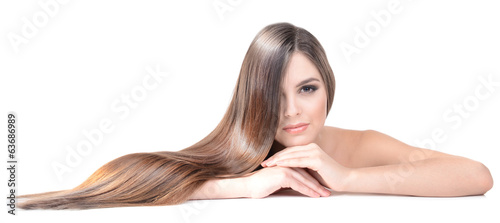 Fotomural Beautiful young woman with long hair isolated on white