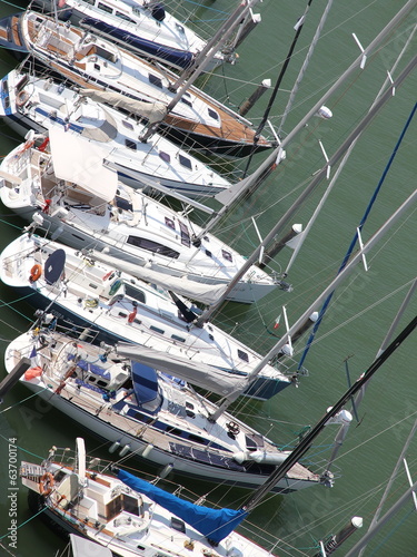 Obraz w ramie yachts and motor boats moored in the prestigious Harbour