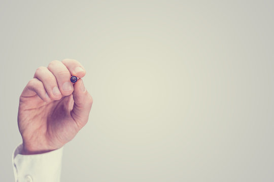 Man writing on a blank virtual screen