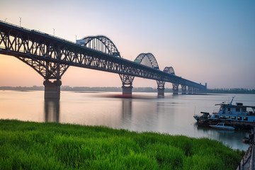 Wall Mural - beautiful jiujiang yangtze river bridge at dusk