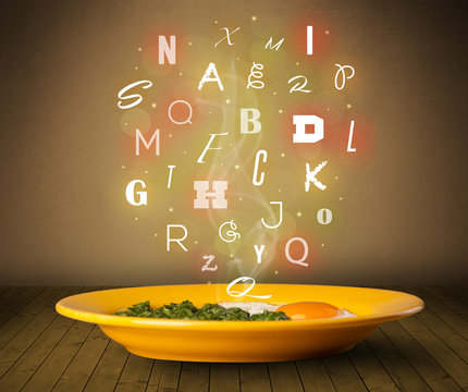 Fresh cook food with colorful letters on wood