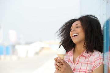 Poster - Young woman holding ice cream cone