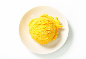 Wall Mural - Scoop of yellow ice cream