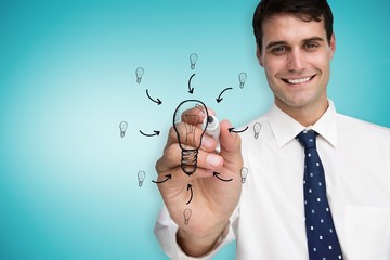Poster - Composite image of businessman drawing light bulb