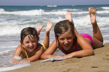 happy girls on the beach