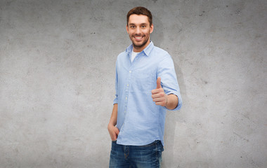 Wall Mural - smiling man showing thumbs up