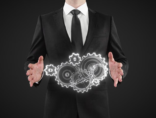 Poster - businessman showing gears