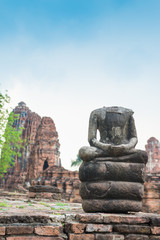 Wall Mural - Ruins of ancient broken buddha at Ayuttaya, Thailand