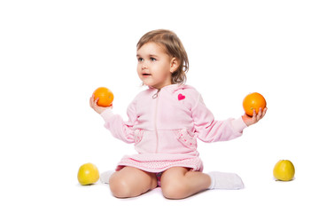 Wall Mural - little girl with oranges