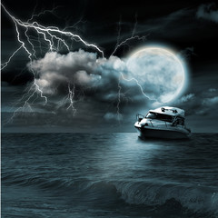 Boat in storm  evening on ocean and the moon