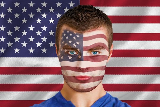 Composite image of serious young usa fan with facepaint