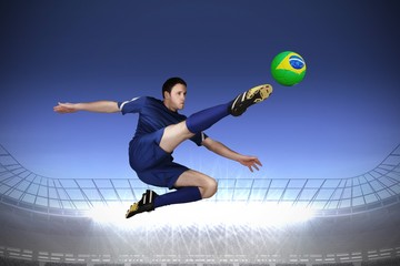 Aufkleber - Composite image of football player in blue kicking