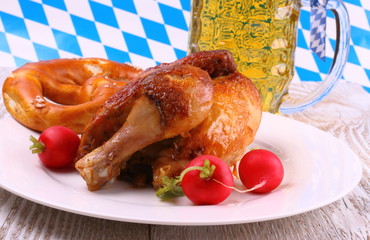 Wall Mural - Oktoberfest chicken and radish, pretzel, beer