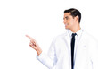© pathdoc - Advertising, doctor pointing with finger at blank copy space