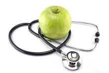 Green Apple With Stethoscope Isolated On White Background