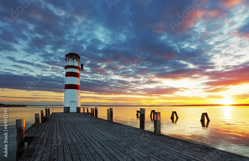 Fototapeta na wymiar Lighthouse at Lake Neusiedl at sunset