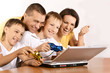 © aletia2011 - Family with laptop