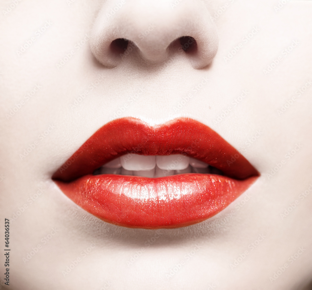 Close up of red glossy female lips - obrazy, fototapety, plakaty 