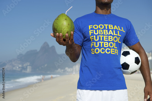 Fotografie, Obraz Brazilian Soccer Football Player Drinking Coconut Rio